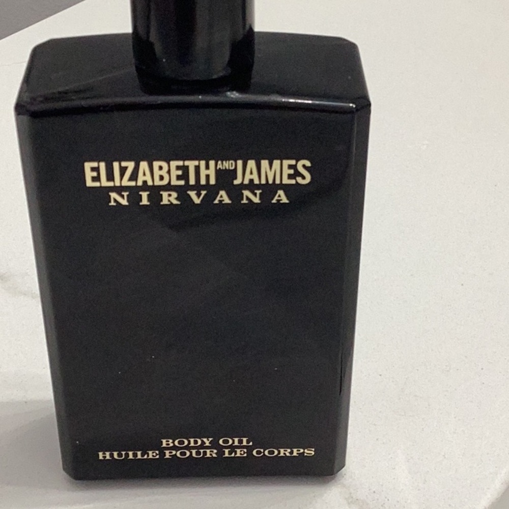 3.4 oz. Elizabeth and James Nirvana Black body oil